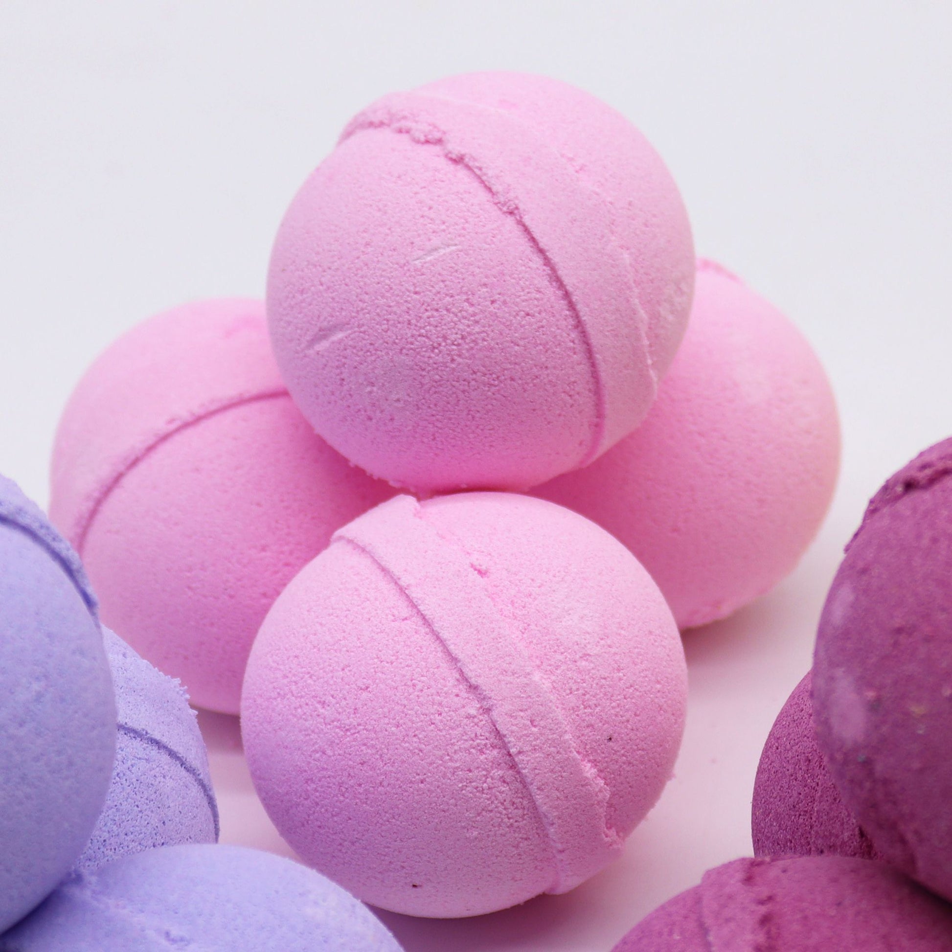 Essential Oil Bath Bomb | Essential Oil Bath Bomb - Frankincense & Rose dissolving in a warm bath