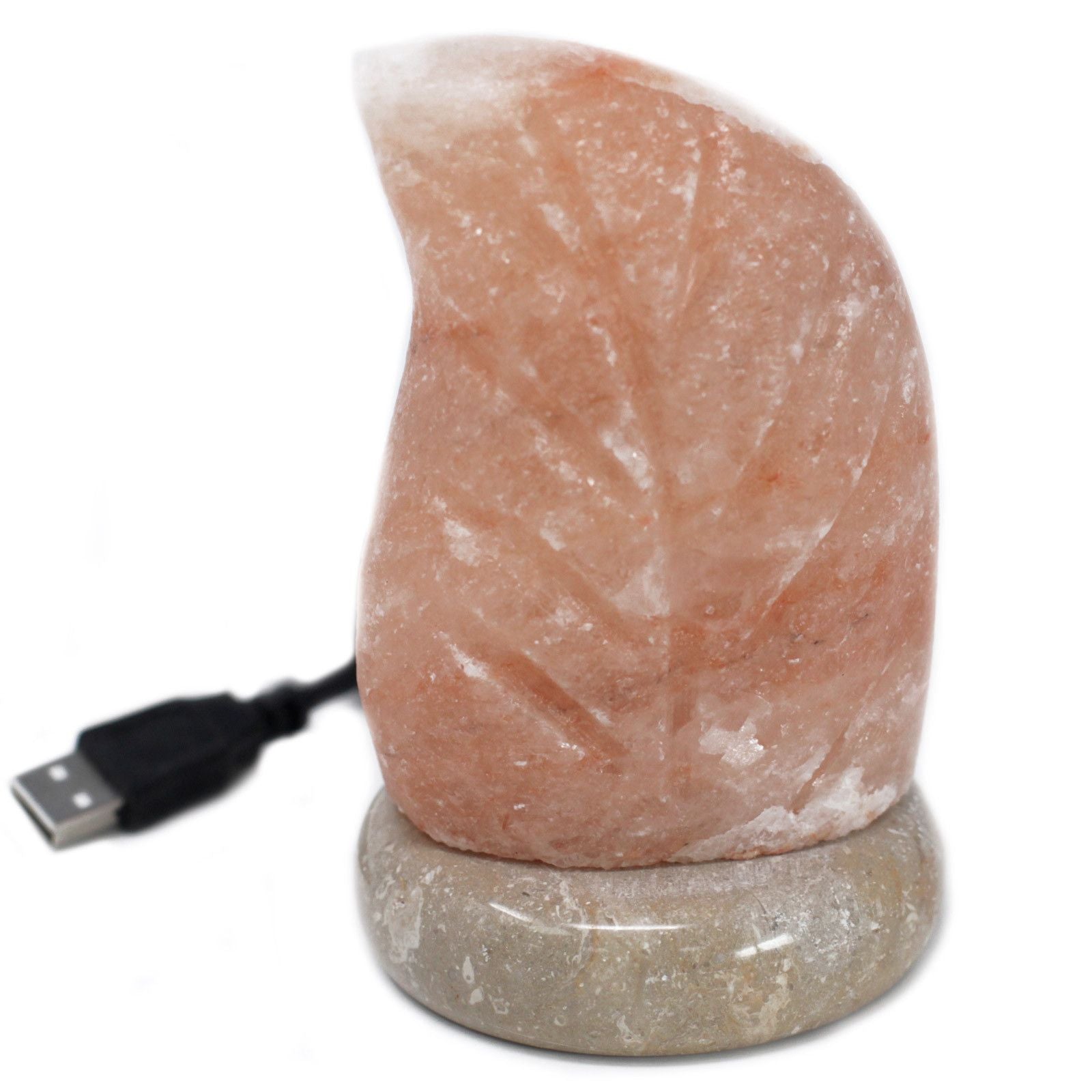 USB Leaf Shaped (Multi) glowing amber on bedside table