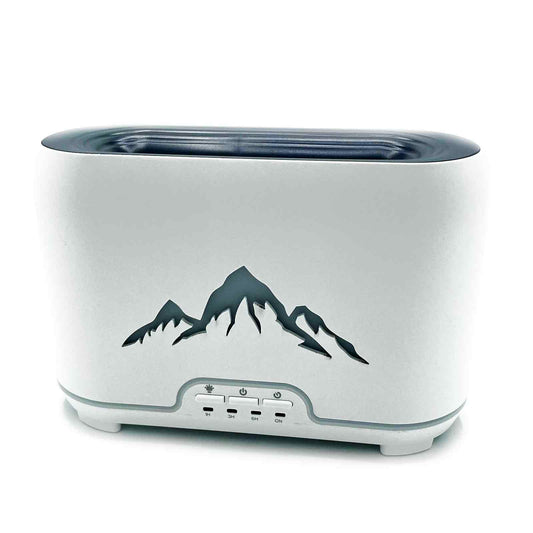 Ultrasonic Aroma Diffuser | Himalayas Aroma Diffuser - USB-C - Remote control - Flame Effect – USB‑C, Flame Effect, Remote on bedside table with essential oils
