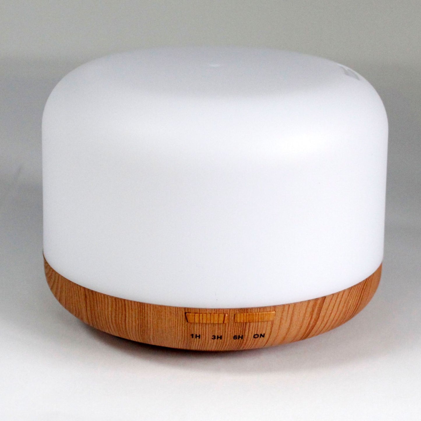 Ultrasonic Aroma Diffuser | Aarhus Atomiser - Classic Pod - USB - Colour Change - Timer – USB, Colour‑Change Light, Timer on bedside table with essential oils