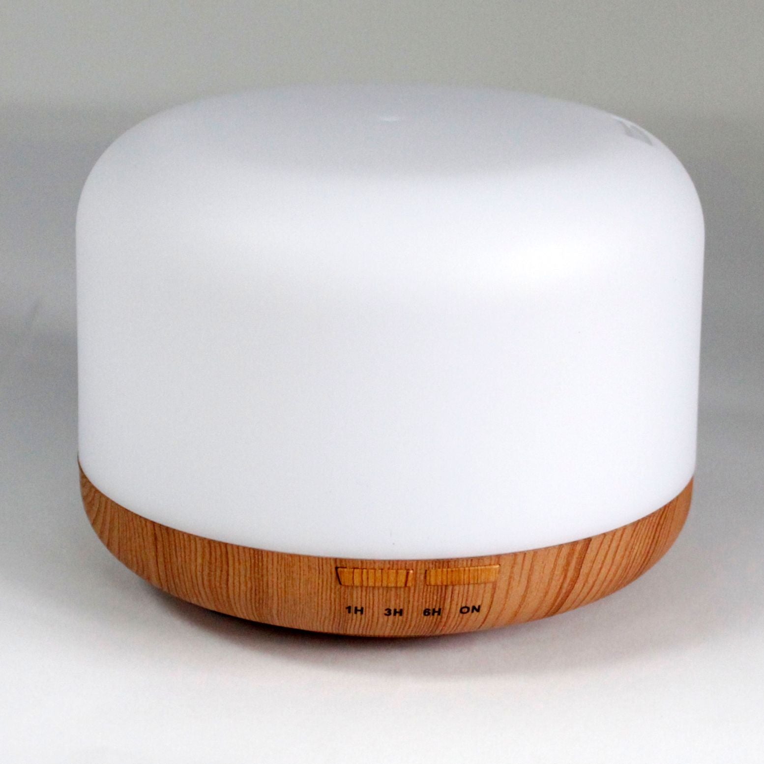 Ultrasonic Aroma Diffuser | Aarhus Atomiser - Classic Pod - USB - Colour Change - Timer – USB, Colour‑Change Light, Timer on bedside table with essential oils