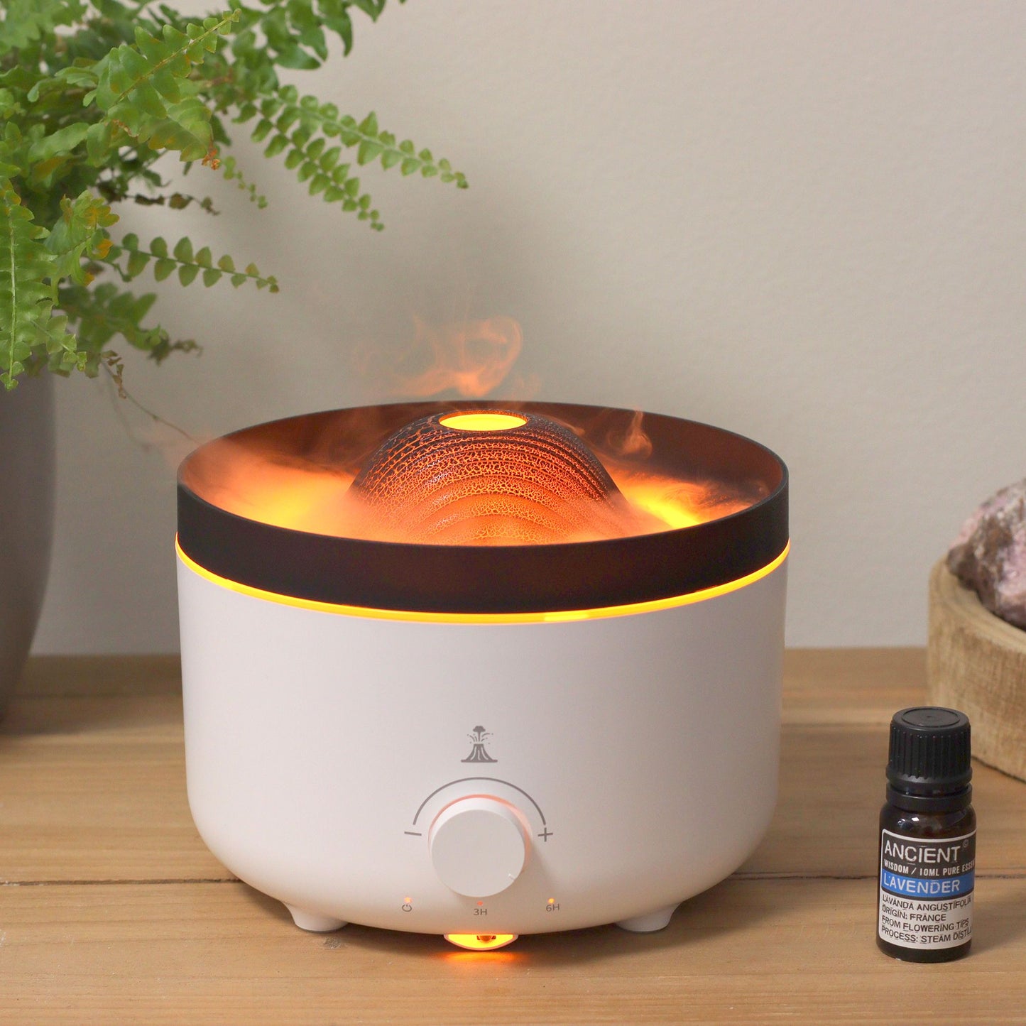 Ultrasonic Aroma Diffuser | Large Volcano Effect Aroma Diffuser (plug) Two Colours - 560ml on bedside table with essential oils