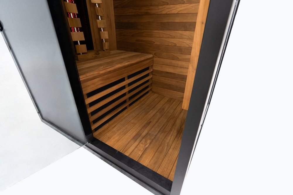 Door-open view showing the bench inside the Hekla IR100 infrared sauna.