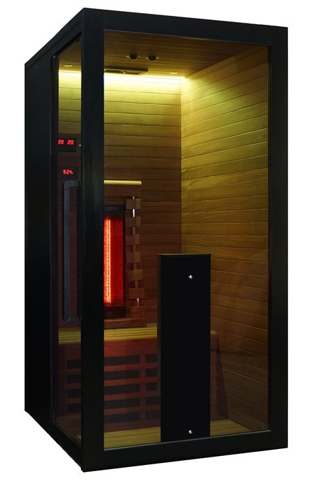 Front angle view showing the interior of the Hekla IR100 infrared sauna with warm lighting.