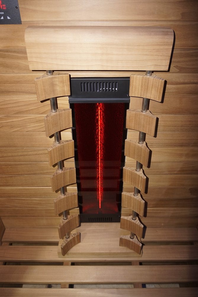 Close-up of the infrared heater and backrest inside the Hekla IR100 sauna.