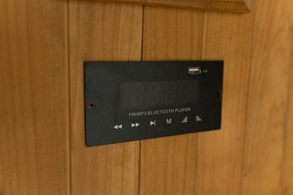 Hekla infrared sauna built-in Bluetooth/USB audio control panel.