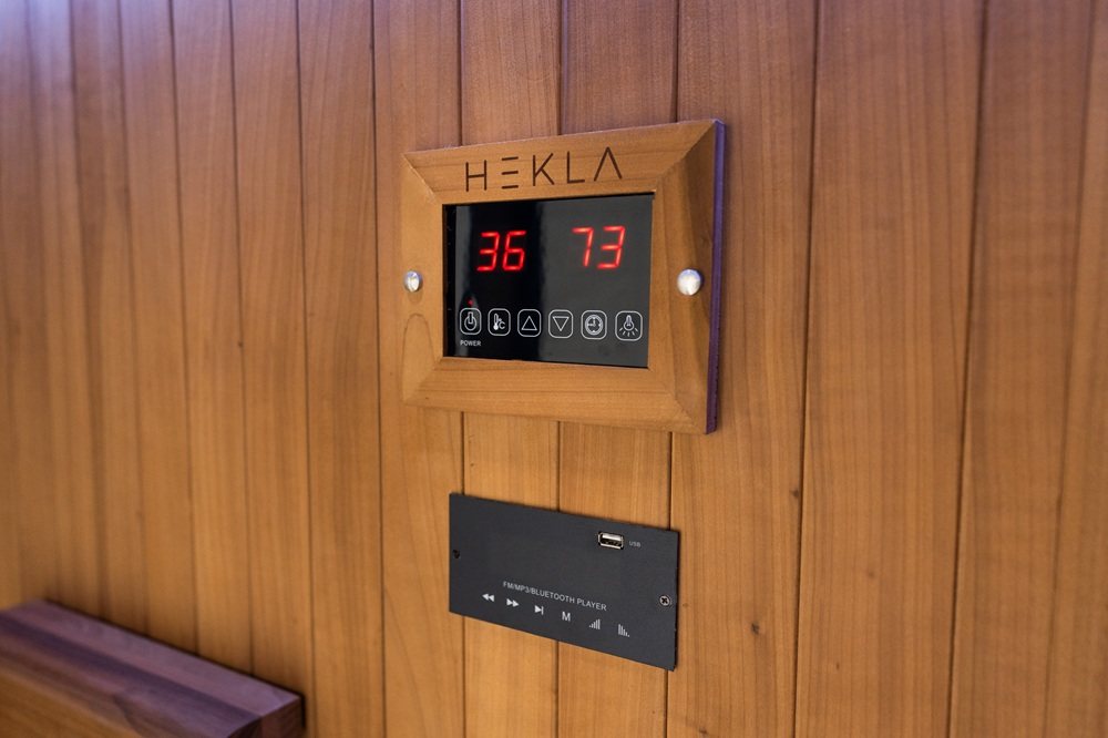 Control panel and audio panel on the Hekla IR160 2 person infrared sauna cabin.