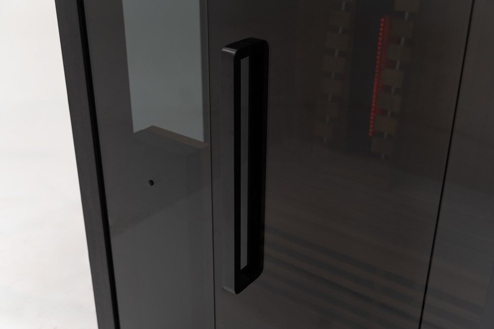 Exterior door handle closeup view of the Hekla IR160 2 person infrared sauna cabin.