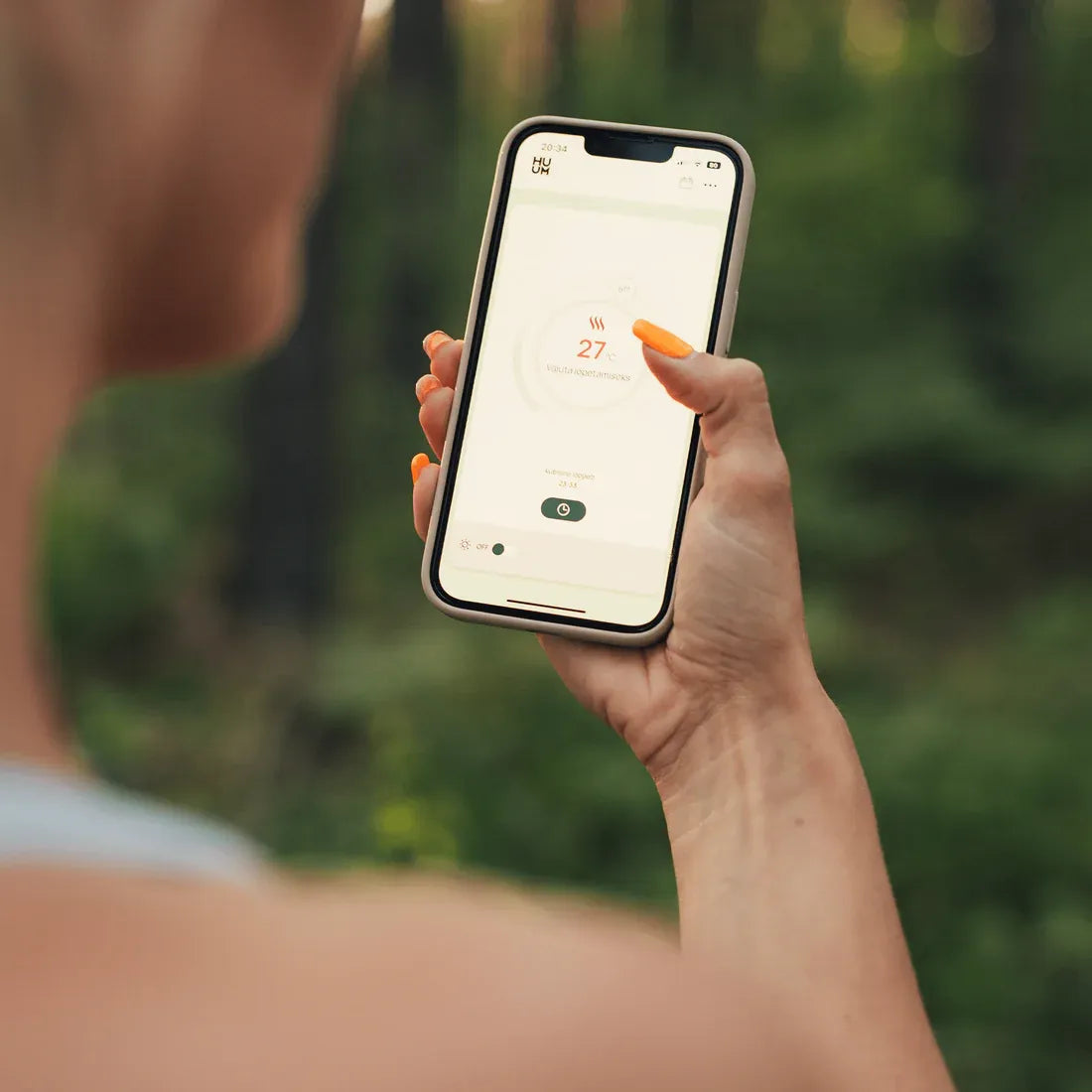 HUUM UKU Wi‑Fi sauna control unit (glass black), main module detail.