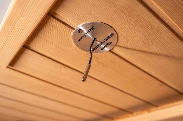 Ceiling vent/fixture inside Within Wellness Select Studio infrared sauna (SRA100-A).