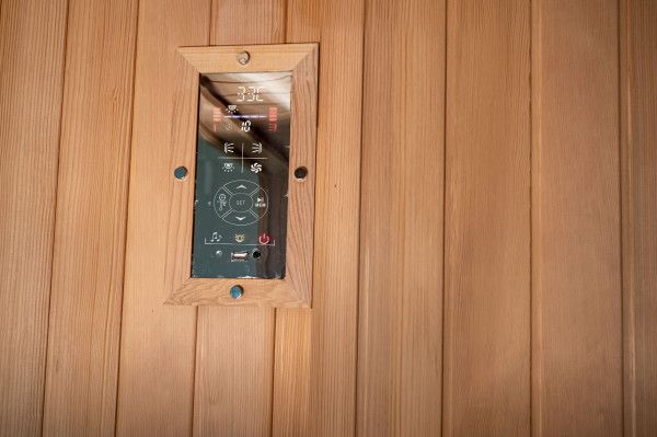 Touch control panel inside Within Wellness Select Studio infrared sauna (SRA100-A).